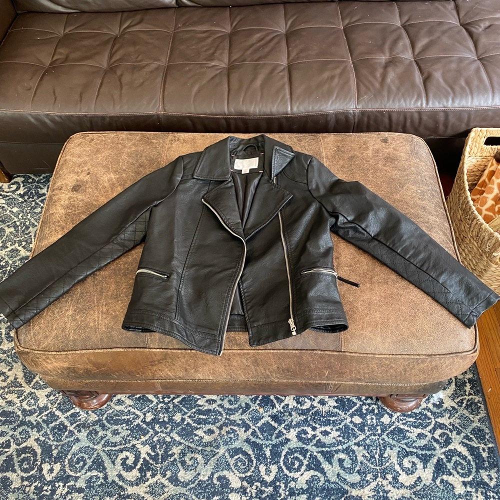 Black leather jacket, size large, good condition.